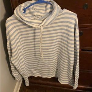 Long sleeved loose fitted turtle neck sweatshirt